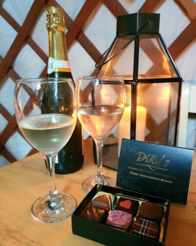 prosecco and chocolates, glamping, romantic getaway, birthday surprise, anniversary surprise
